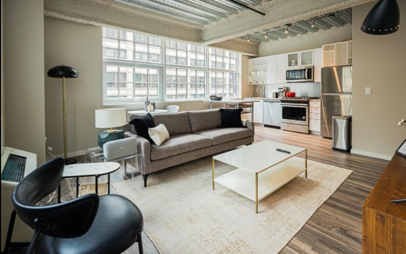 a living room with a couch and a table
